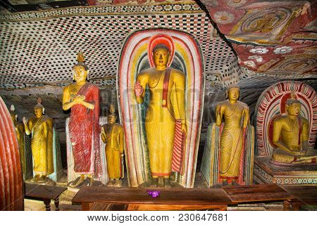 DAMBULLA SRI LANKA - DEC 27, 2016: Buddha statues inside Dambulla Cave Temple. Cave Temple is a World Heritage Site near Dambulla city on Dec 27, 2016. Sri Lanka.