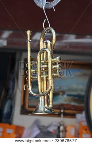 Damaged Beaten Brass Small Trumpet Instrument At Flea Market