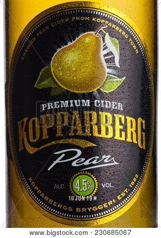 London, Uk - March 10, 2018 : Cold Bottle Label Of Kopparberg Premium Cider With Pear Flavor On Whit