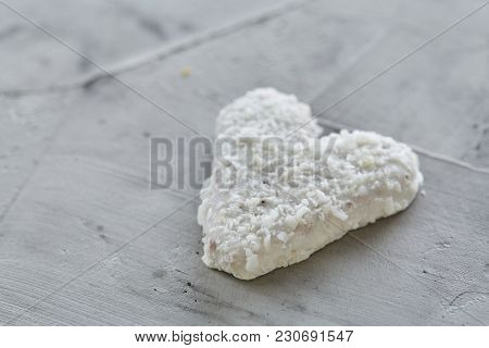 Sweet Crunchy Coconat Heart-shaped Biscuits Arranged In Pattern On Light Textured Background, Top Vi
