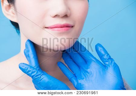 Women With Thyroid Gland Problem On The Blue Background