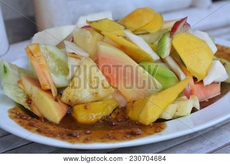 Indonesian Traditional Salad Fruits Dish Called Rujak Or Lotis, Consist Of Mixture Cutting Fruits Li