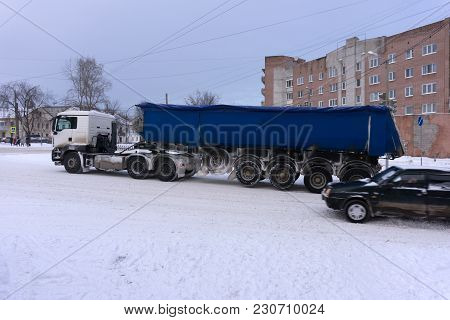 Semi Truck In Motion. Speeding Truck On The Highway. Trucking Business Concept