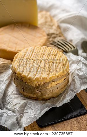 Tasting Of Oldest French Aoc Soft Pudgent Yellow Cheese Livarot And Munster, French Cheese