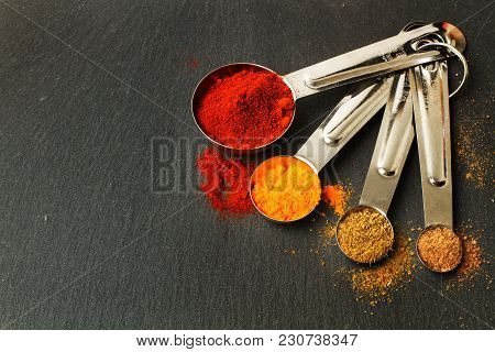 Stainles Steel Spoons To Measure Cooking Ingredients Whit Spices
