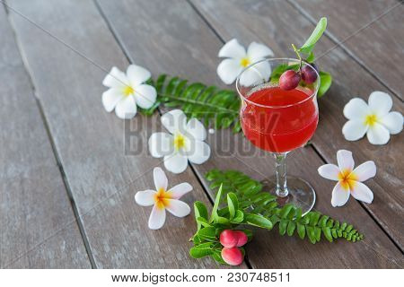 The Red Juice Of Ancient Thailand Name Carunda Or Karonda (carissa Carandas L.), Thai Herb Juice.