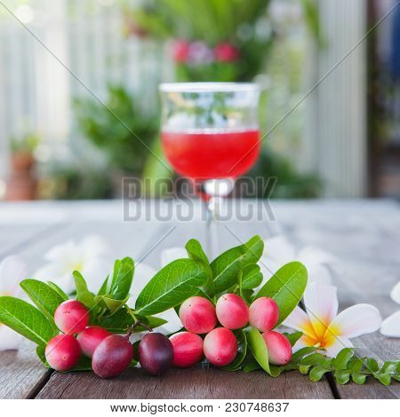The Red Juice Of Ancient Thailand Name Carunda Or Karonda (carissa Carandas L.), Thai Herb Juice.
