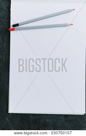 Notepad With Pencils Mocap. Place For Text.