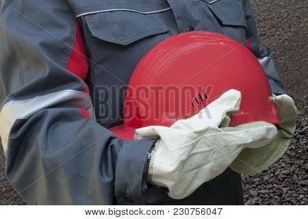 A Helmet For Protection .   Working Gloves. Female Hard Work.  Dangerous Production . Labor Protecti