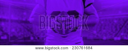 duo toned american football player in  arena at night with stadium lights