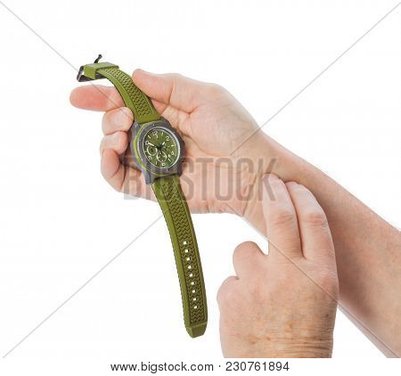 Hand of old man taking pulse isolated on white background