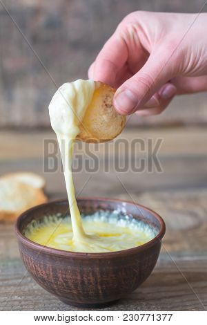 Bowl Of Cheese Dip With Toasts