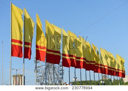 Flags Of Chuvash High-flying Poles Against The Blue Sky