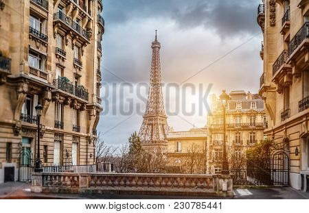 The Eifel Tower In Paris From A Tiny Street
