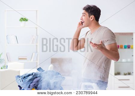 Inattentive husband burning clothing while ironing