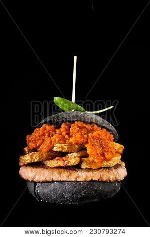 Italian Black Burger With Sausages Salamella , Potato And Vegetable Sauce