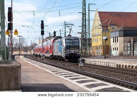 Fuerth / Germany - March 11, 2018: Re Regional Express Train From Deutsche Bahn Passes Train Station