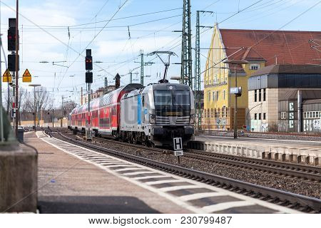 Fuerth / Germany - March 11, 2018: Re Regional Express Train From Deutsche Bahn Passes Train Station