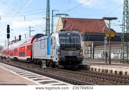 Fuerth / Germany - March 11, 2018: Re Regional Express Train From Deutsche Bahn Passes Train Station