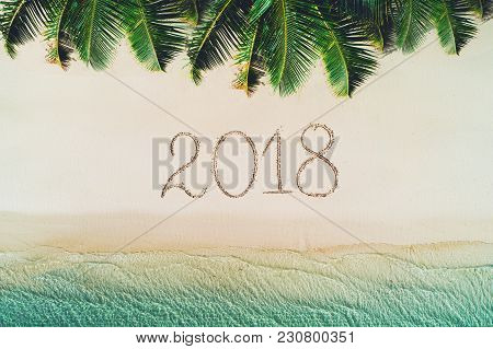 Summer Holiday On Tropical Island. 2018 Write On Beach Sand. Palm Trees And Sea Waves.
