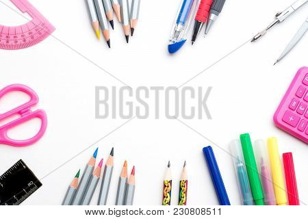 Colorful Different School Stationery Isolated Frame On A White Blank Background - Copyspace Top View