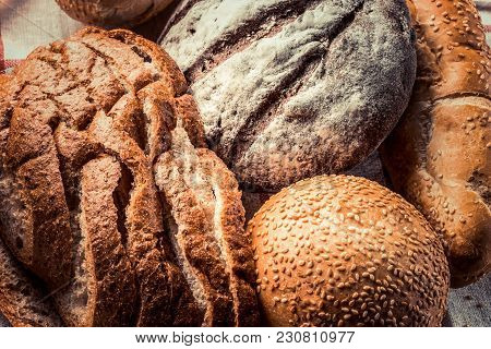 Freshly Baked Whole And Sliced, Black And White Different Types Of Bread - Food Background