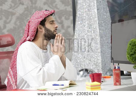 Arabian Business Man Working On Laptop In The Office.