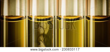 Yellow Liquid Machine Oil In Small Tubes