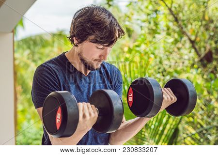 Bicep Curl - Weight Training Fitness Man Outside Working Out Arms Lifting Dumbbells Doing Biceps Cur