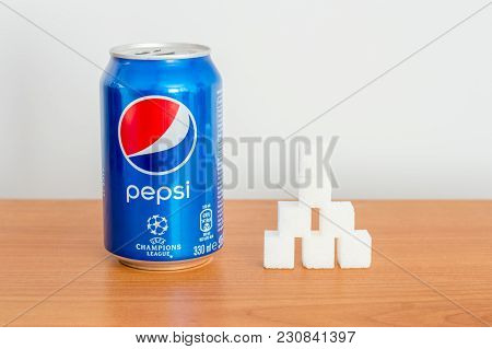 Pruszcz Gdanski, Poland - March 5, 2018: Can Of 330ml Pepsi Drink And Sugar Cubes.