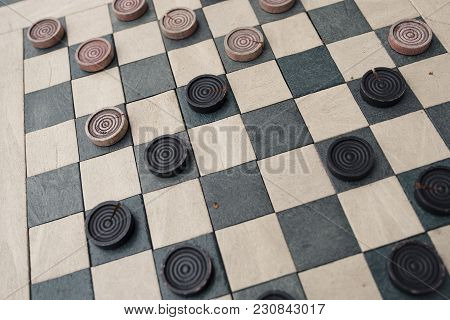 Checkers Game In Public On Sidewalk, Step Up And Take A Seat To Play The Game With A Friend Or Stran