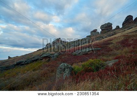 Autumn On The Ku Mountain Range. A Mountain Range Is A Series Of Mountains Or Hills Ranged In A Line