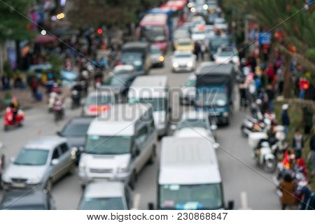 Aerial Blurred Image Of Traffic Jam In City. Urban Infrastructure Problem.