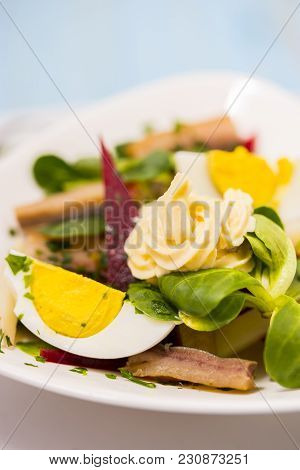 Potato Salad With Red Beet, Smoked Herring, Egg And Soy-bean Mayonnaise. Close-up Photo. Copy Space.