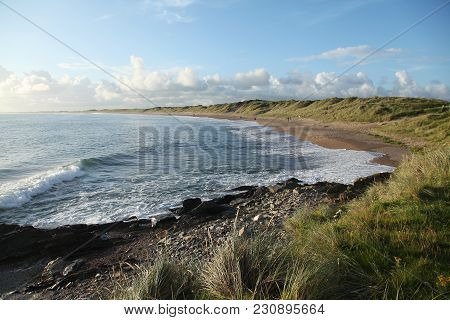 Waves On The Beach In The Evening In Kilmore Quay In Ireland