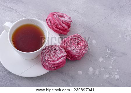Top View Cup Tea And Sweet Meringue Cookies With Copy Space