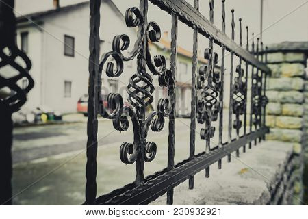 Wrought Iron And Cut Stone Fence, Fence With Ornaments