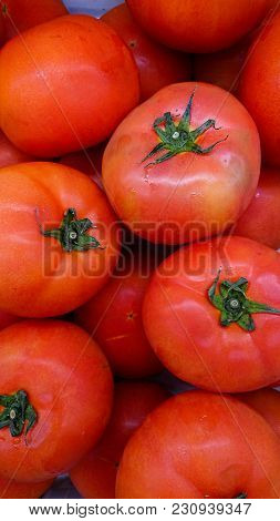 Tomatoes For Sale At The Vegetables Market.
