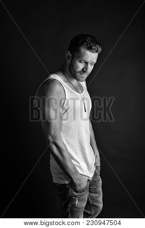 Fashion Model On Grey Background. Man With Sad Unshaven Face In Studio. Style And Look, Barber. Fash