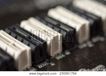 Pci-e Slots Close Up. Printed Circuit Board. Computer Motherboard Background.