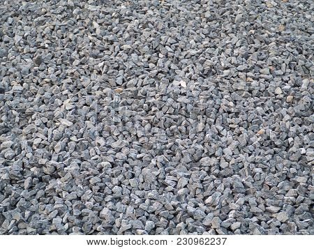 Gravel Road , Stone And Sand In Gray Shades , Rural Road Construction.