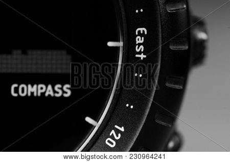 Detail Closeup Of Black Wristwatch With Compass