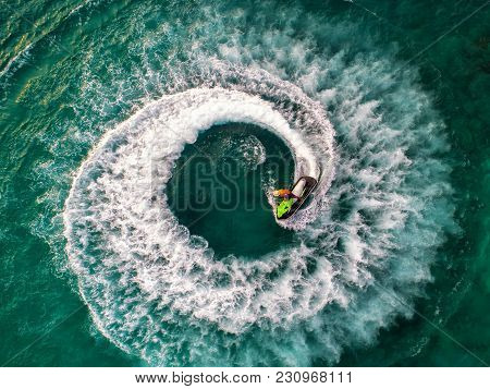 People Are Playing Jet Ski At Sea During The Holidays.