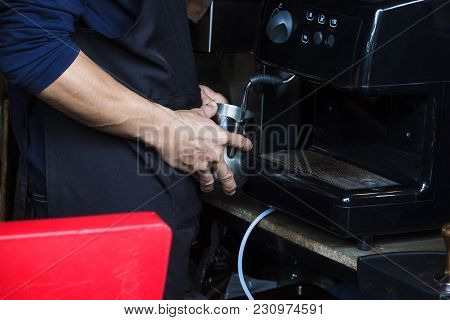 Barista Using Coffee Machine To Steaming Milk Froth For Preparing Coffee. Microfoam Is Milk Formed U