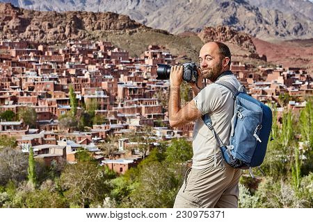 Solo Journey Through Iran, An Independent Tourist Photographs The Village Of Abyaneh During A Self-g