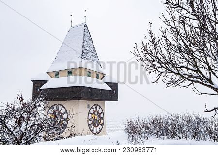 Snow Covered Uhrturm Clocktower Landmark Of City Graz On Hill Schlossberg In Winter