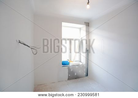 Interior Of Small Room With Plasterboard  Gypsum Walls Painted By White Color In Apartment Is Under 