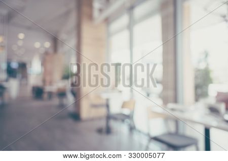 Blurred Images Of The Coffee Shop Interior Background And Lighting Bokeh