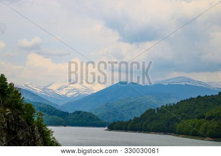 Vidraru Lake Landscape From Romania Transfagaras, Dam In The Montains Nature Travel And Tourism In F