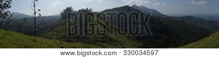 Panorama Over The Green Lush Tea Plantations In Munnar, India
